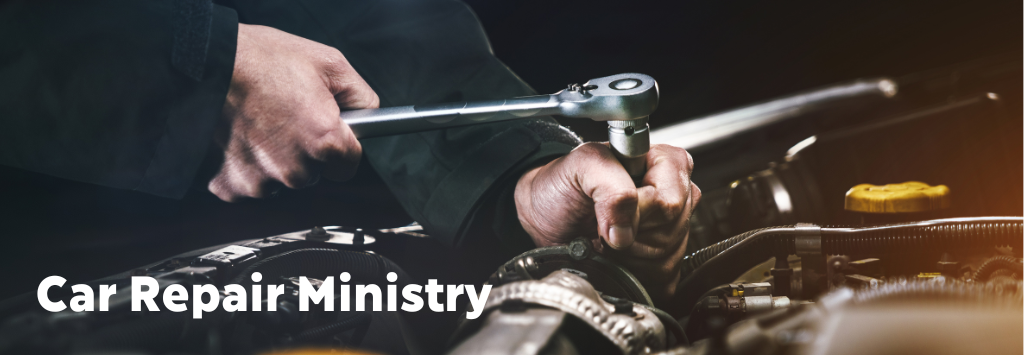 mechanic working on an engine