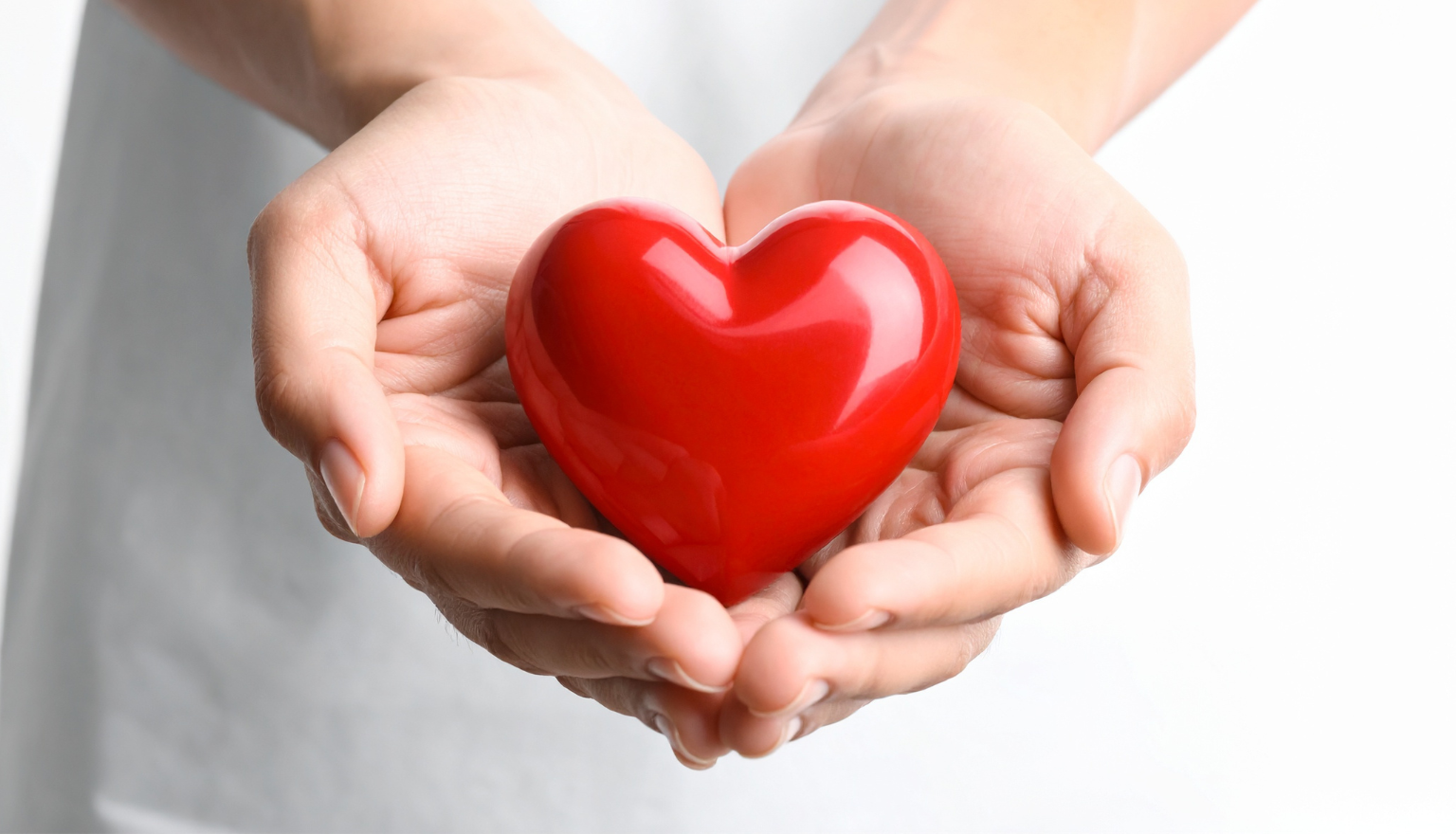 Hands holding heart
